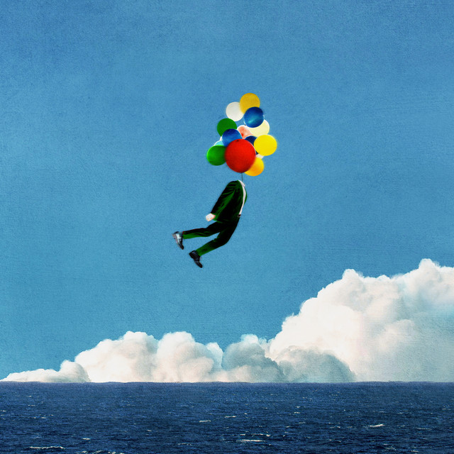 Artistic album cover featuring a surreal illustration of a figure floating with colorful balloons against a blue sky and ocean backdrop